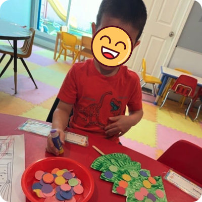 Child working on a classroom craft