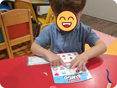 Child playing a classroom matching game